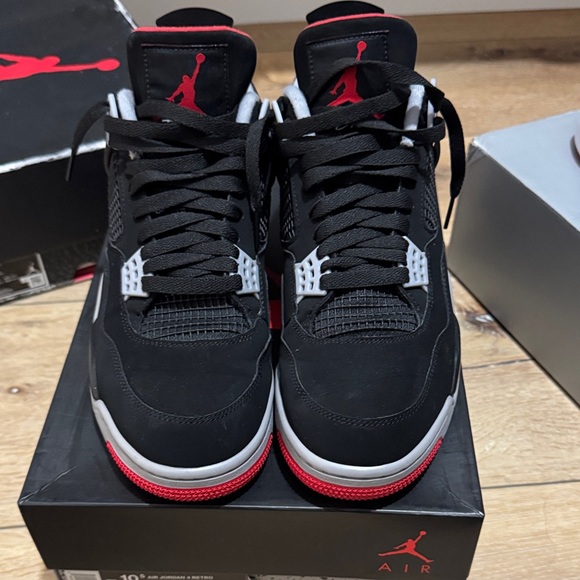Air Jordan 4 Black and Red Sneakers - Picture 1 of 6